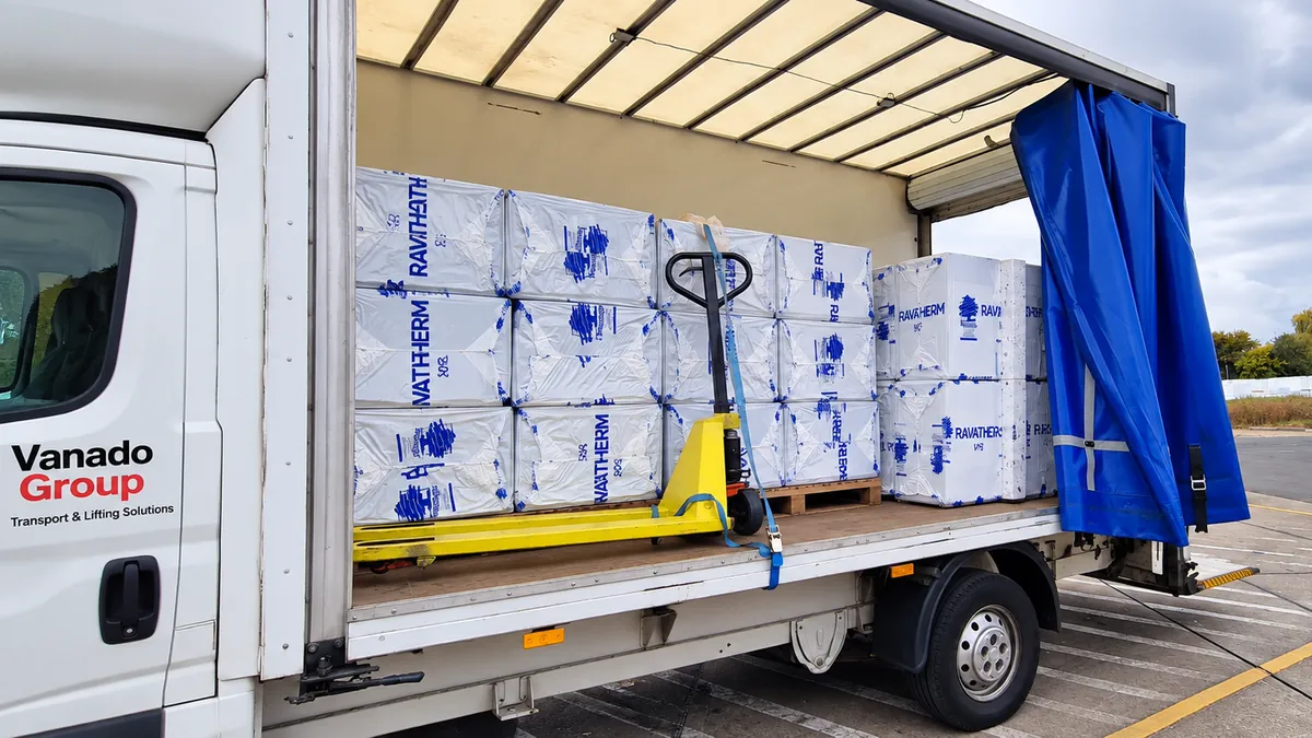 Palletised goods loaded on a curtain-sided vehicle ready for delivery